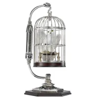 FIGURA EN MINIATURA THE NOBLE COLLECTION HARRY POTTER HEDWIG EN JAULA